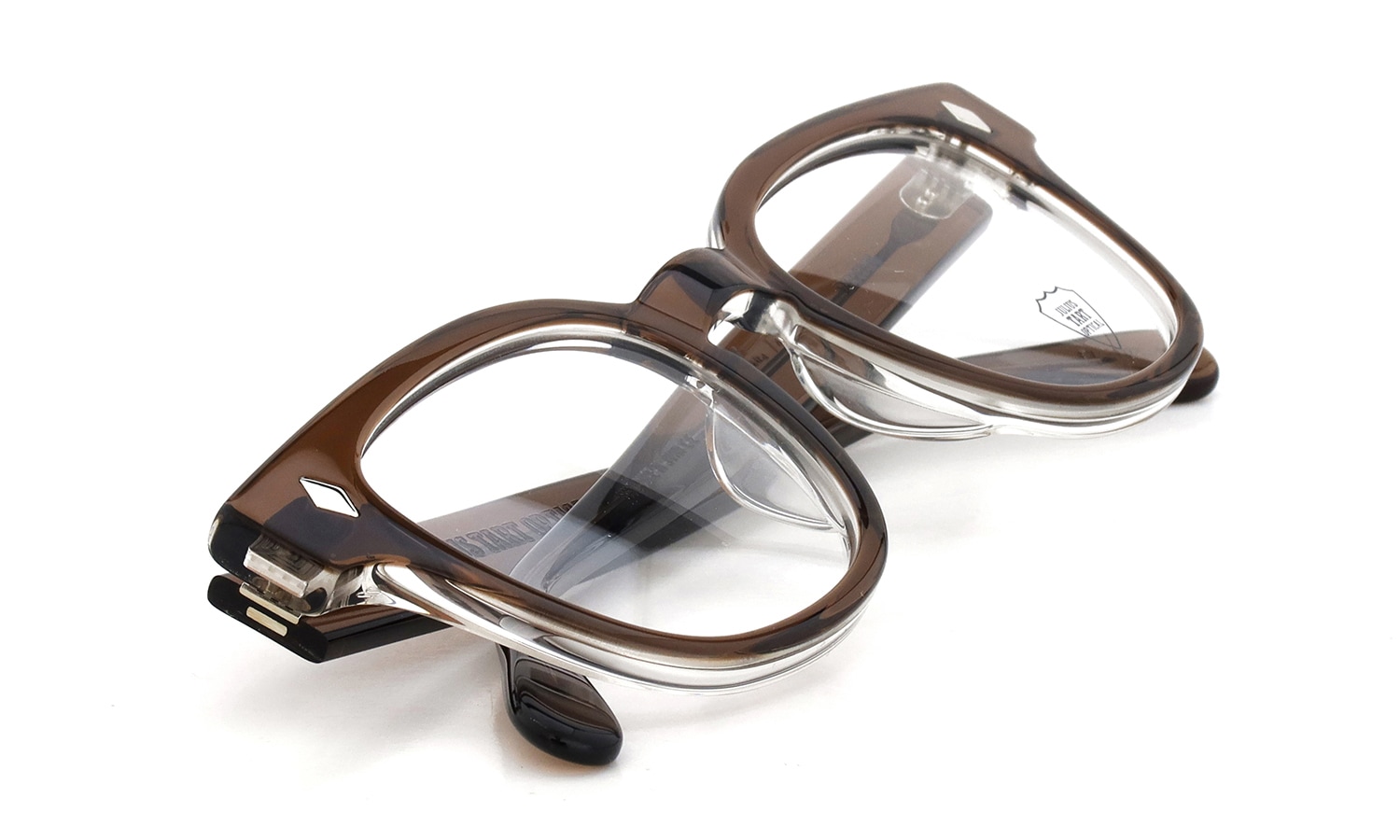 JULIUS TART OPTICAL メガネ BRYAN-48-22 col.BROWN CRYSTAL II 折りたたんだ状態1