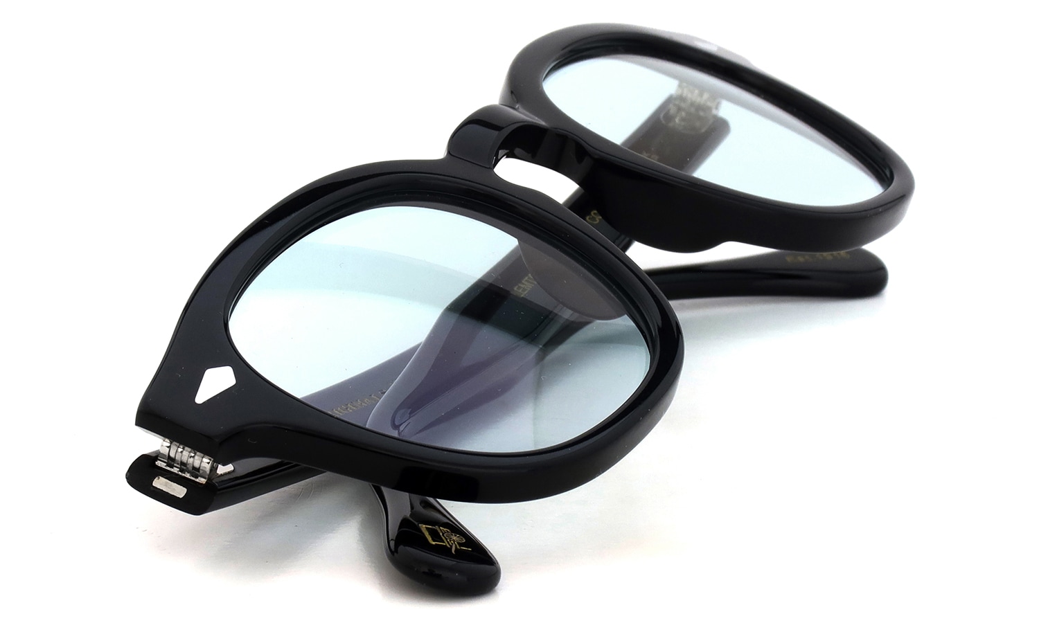MOSCOT 紫外線調光サングラス LEMTOSH 49size(L) col.BLACK BLUE+ 折り畳んだ状態