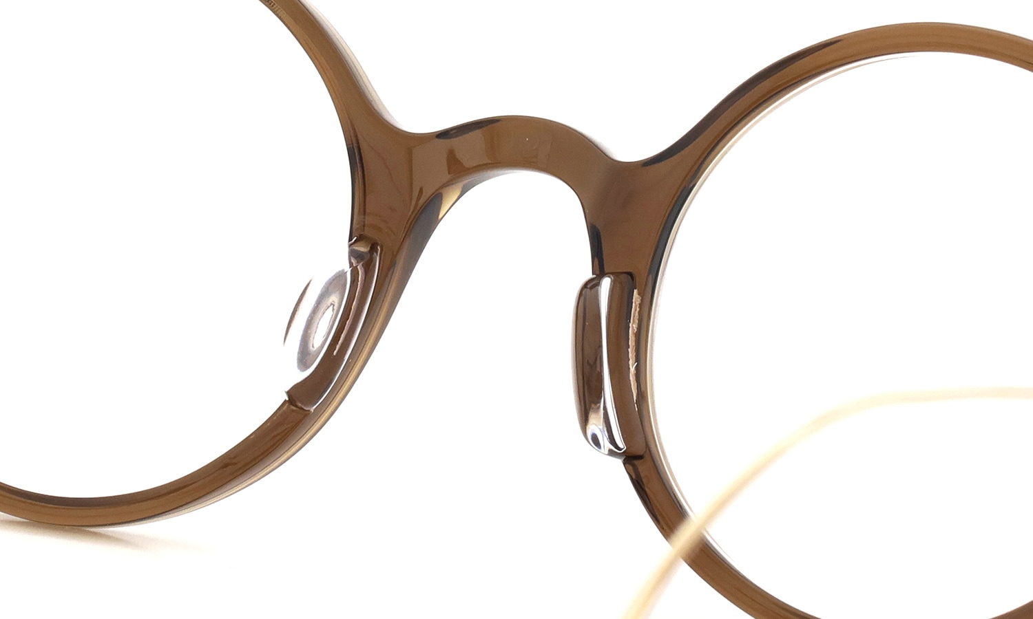 Oliver Goldsmith 100周年記念モデル 限定復刻メガネ通販 PORTSMOUTH col.Whiskey アジア仕様のクリア鼻パッドとブリッジディテール