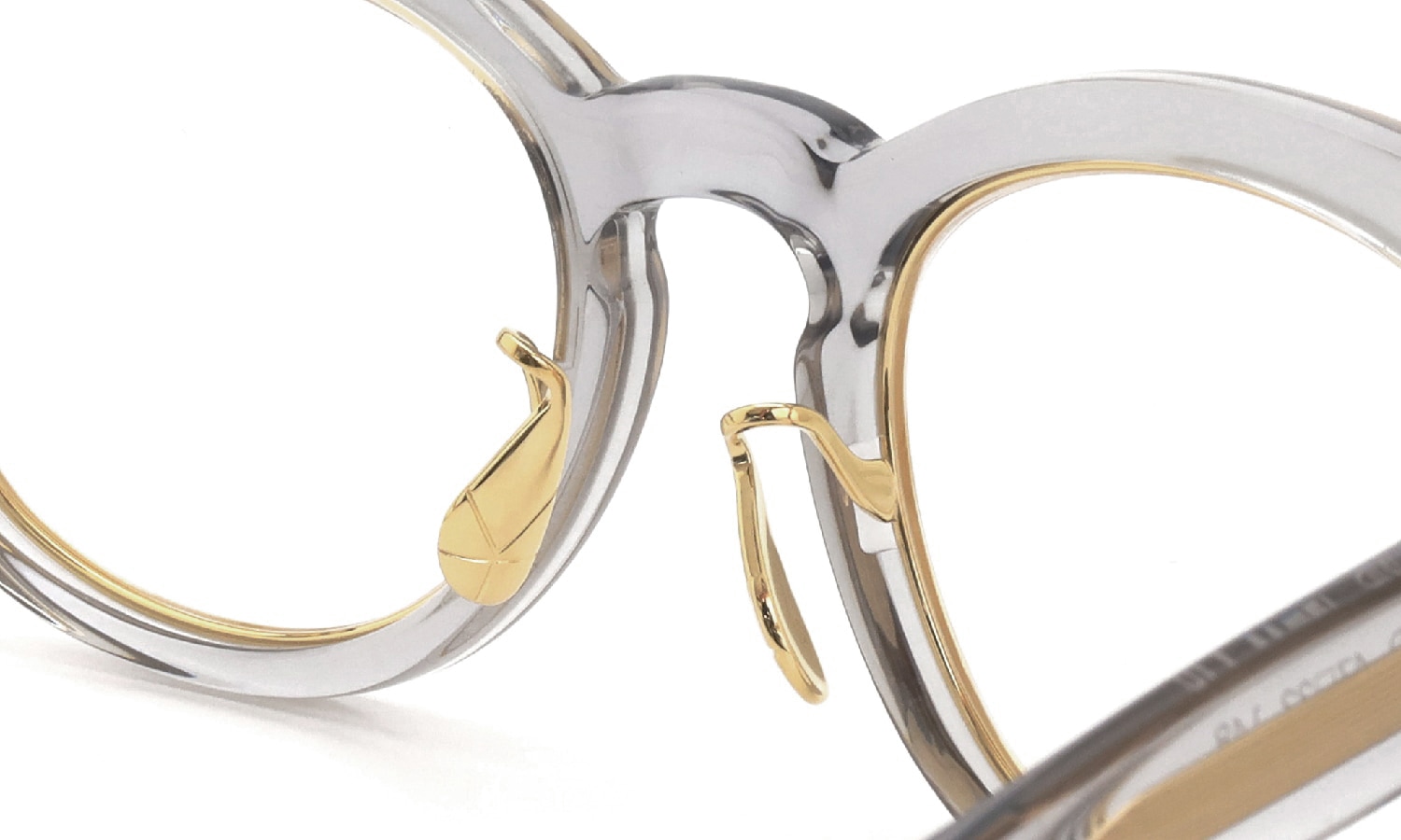 YUICHI TOYAMA. メガネ通販 U-128RS IND COL.08(旧:col.04) Clear gray / Gold ブリッジ裏側とパットのディテール