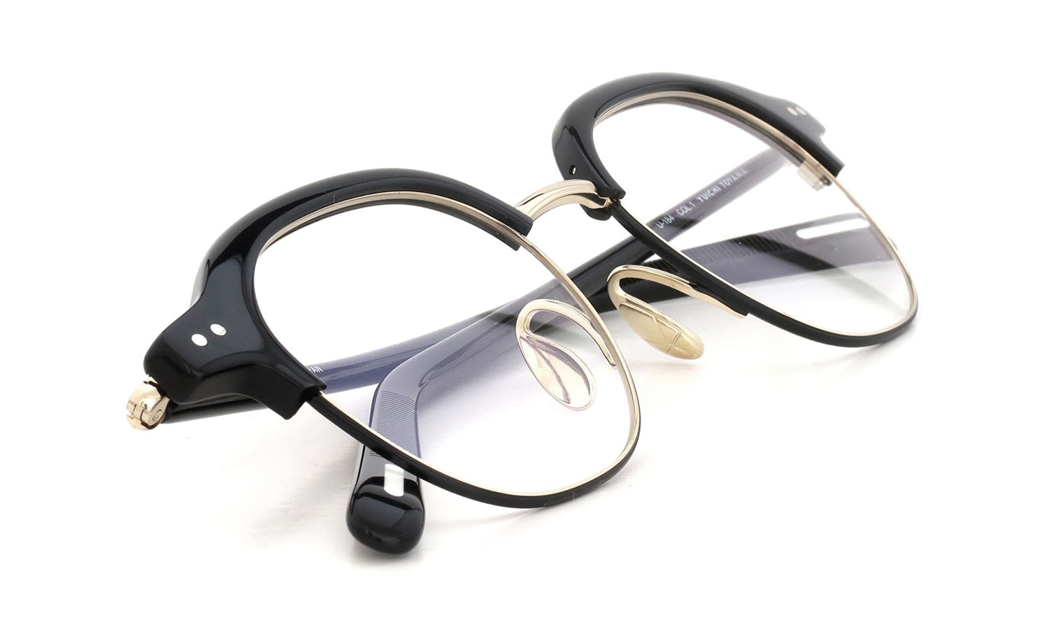 YUICHI TOYAMA. メガネ通販 U-184 DUD col.01 Black /White gold + Semi matt black 折りたたみ斜め 1