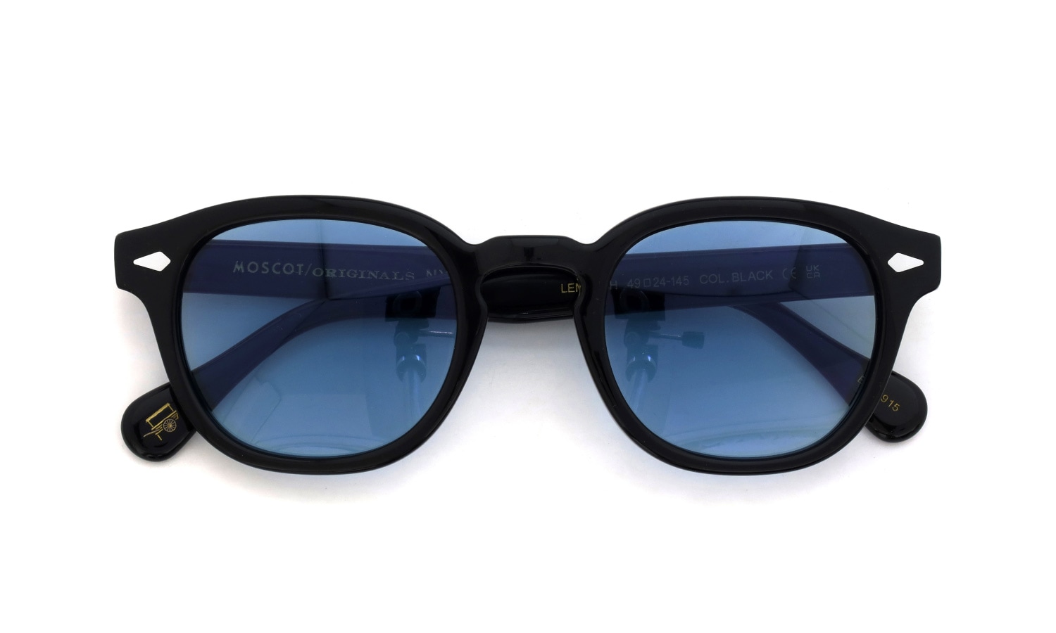 MOSCOT 紫外線調光サングラス LEMTOSH 49size(M) col.BLACK BLUE+ 偏光反応の濃いレンズの状態